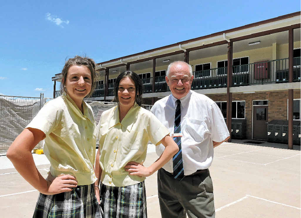 FLYING START: Year 9 students Isabelle Hilton, Makenzi Burton and principal Peter Moloney, pictured outside the school’s new Murphy Wing, look forward to welcoming both Year 8s and Year 7s next year. FLYING START: Year 9 students Isabelle Hilton, Makenzi Burton and principal Peter Moloney, pictured outside the school’s new Murphy Wing, look forward to welcoming both Year 8s and Year 7s next year.